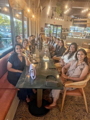 Group of women dining together at a restaurant.