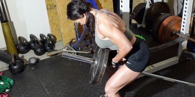 Shawna Hanchosky shows how to do t bar rows 
