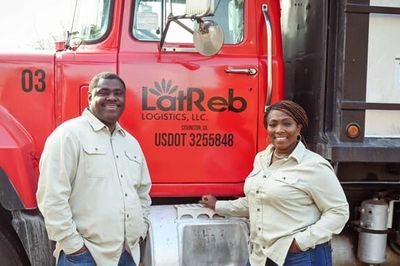 Commission Chairman Marcello Banes is pictured with Stephanie Lindsey next to their trucking company 