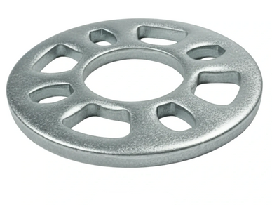 Metal wheel spacer with multiple cutouts for automotive use.