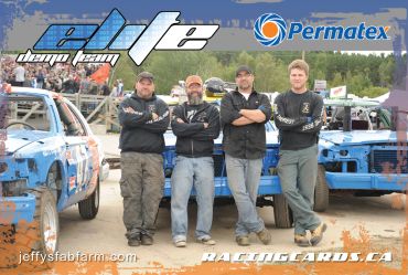 Four men posing in front of blue race cars at a demo team event.