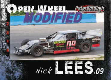 Black and red modified race car #09 at Peterborough Speedway in 2014.