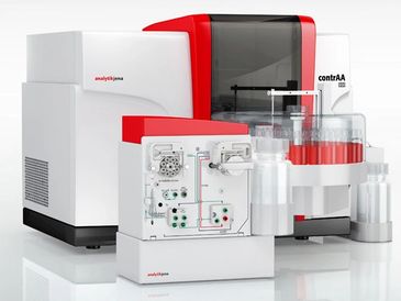 Advanced laboratory instrument for chemical analysis with red and white design.