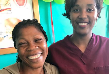 Showing off her bright smile after visiting a Haiti Clinic dentist