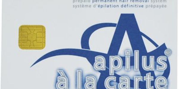 Close-up of an Apilus prepaid permanent hair removal system card with a chip.