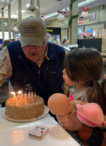 Randy celebrating his birthday with his grand-daughter and the staff of The Market. Happy Birthday!