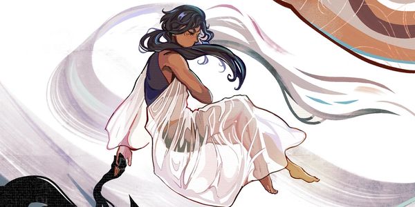 A woman in a flowing white dress sits with flowing hair and a contemplative expression.