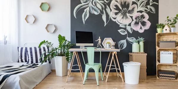 Clean home office with reading nook and shelf, pristine from Simply Elegant Co's residential service.