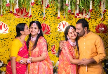 Two couples sharing loving kisses during a celebration.