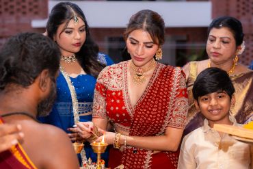 Family participates in a traditional ceremony.