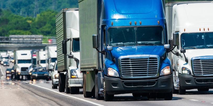 Group of trucks on interstate