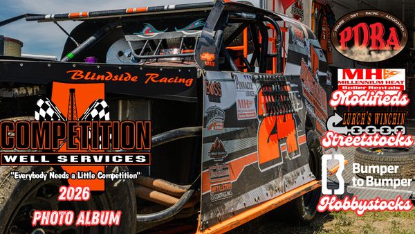 Off-road racing car with competition service logos and 2026 photo album text.