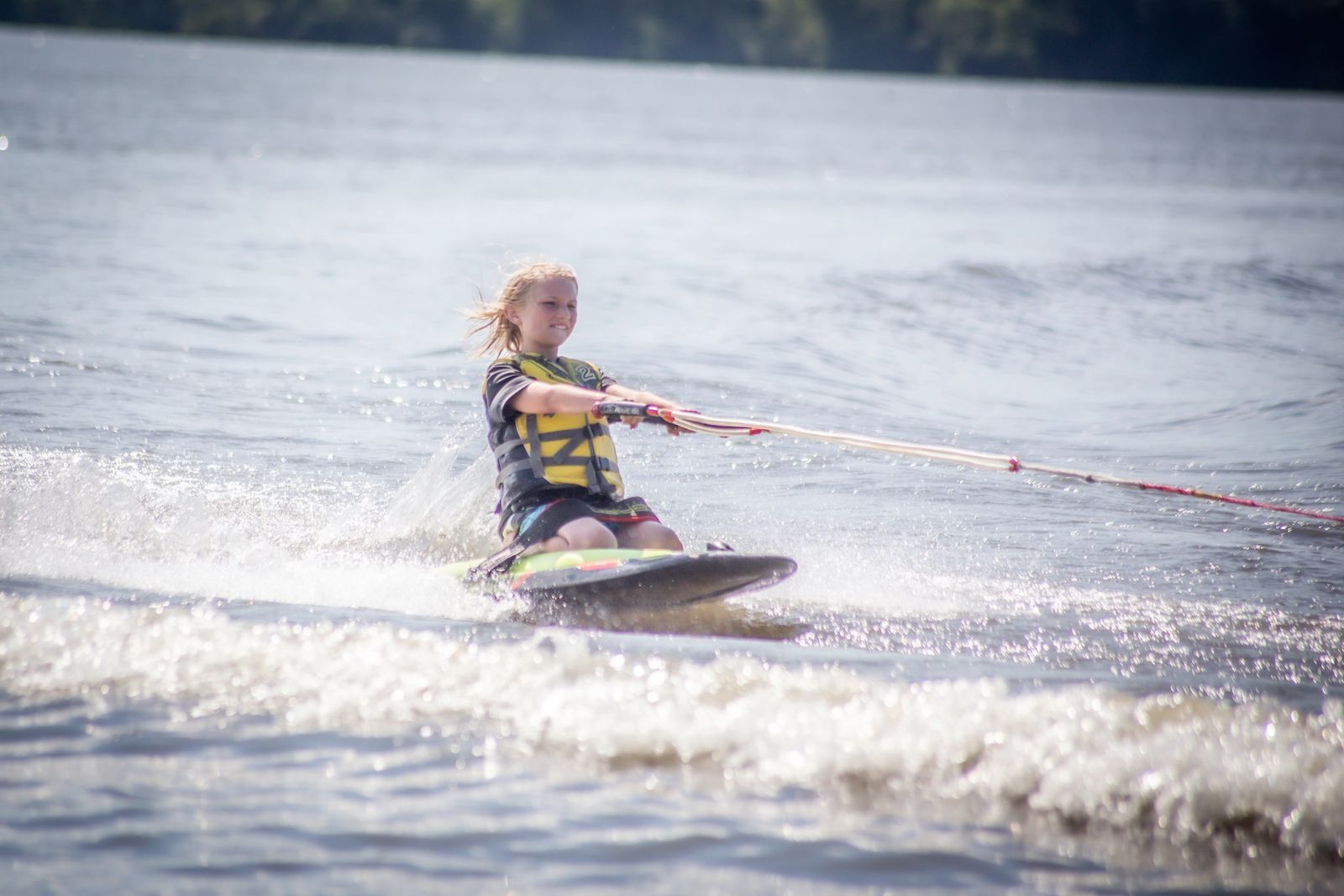 Kneeboarding on Lake Benton on a sunny day