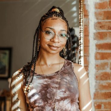 Massage therapist, Idesia, smiling