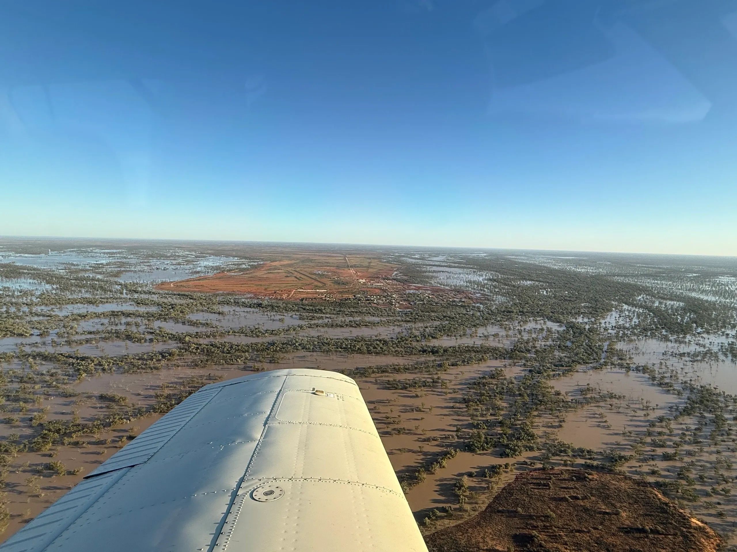 Thargomindah popping its head above the Bulloo River's waters as flooding begins to subside
