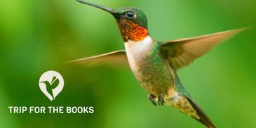 A hummingbird in flight with the text 'Trip for the Books' and a bird logo.