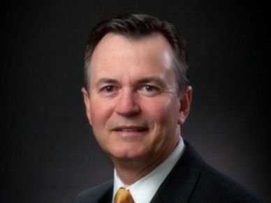 Larry S. Starks- Senior Managing Director 