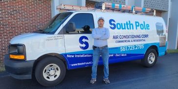 South Pole Air Conditioning Corp. White and blue Air conditioning truck.