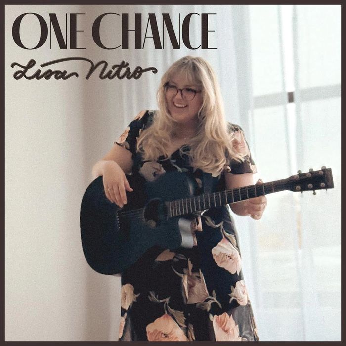Lisa Nitro with guitar on album cover titled 'One Chance'.