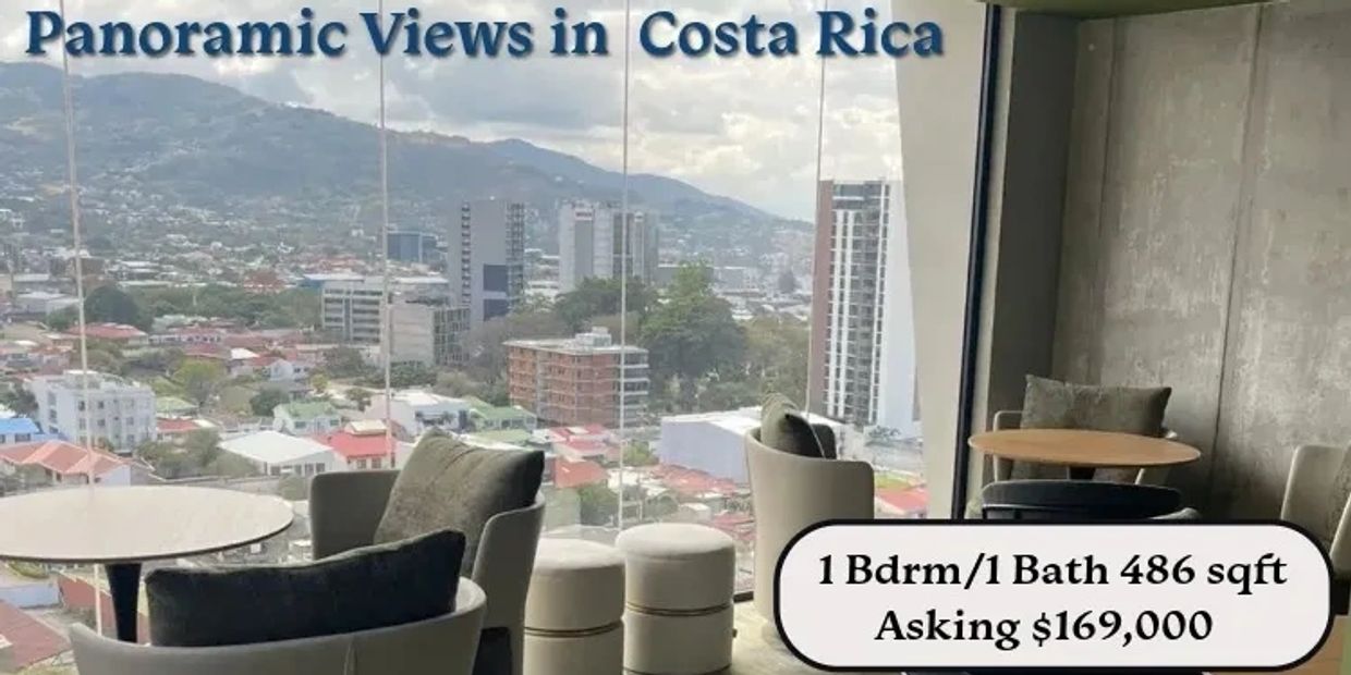 Panoramic city views from a modern apartment in Costa Rica.