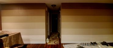 Brown gradient accent wall.