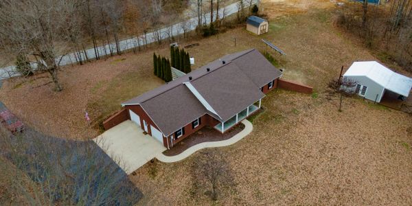 Aerial photograph of a home in the country