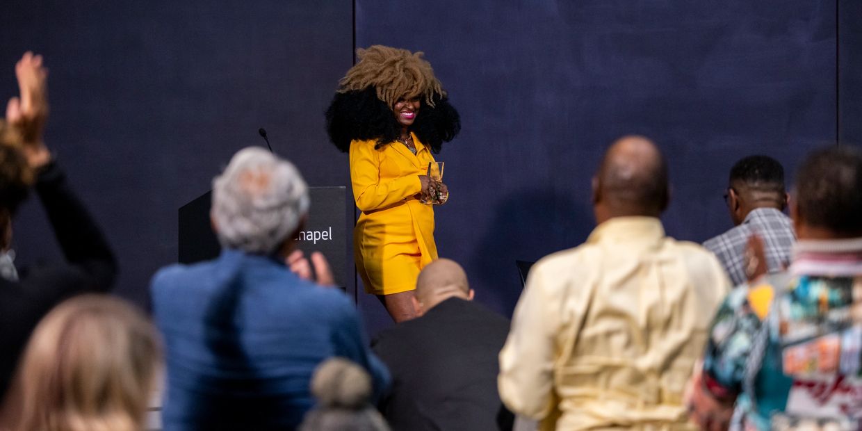 Photo of Secunda Joseph receiving The 2023 Oscar Romero Humanitarian award from the Rothko Chapel