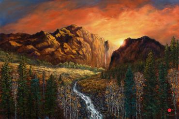 brilliant sunset in mountain canyon with stream  and meadow