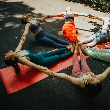 Students in an outdoor yoga fitness class