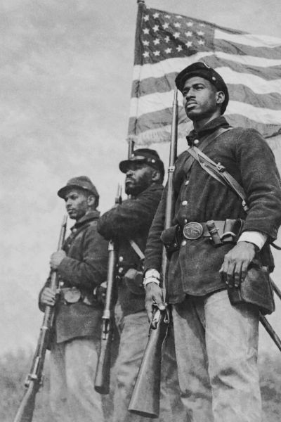 African American soldiers from the Civil War with an American flag.