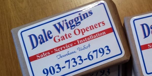 Business card for Dale Wiggins Gate Openers with contact details.