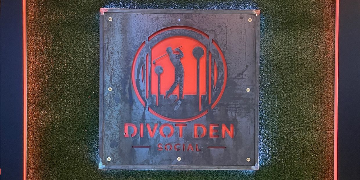 Divot den custom sign