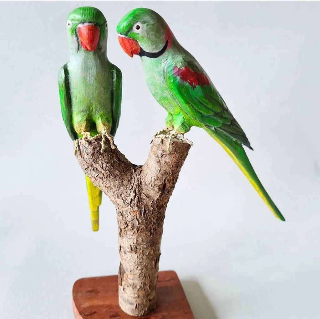 Pair of hand carved & painted wooden Alexandrine parrots display.