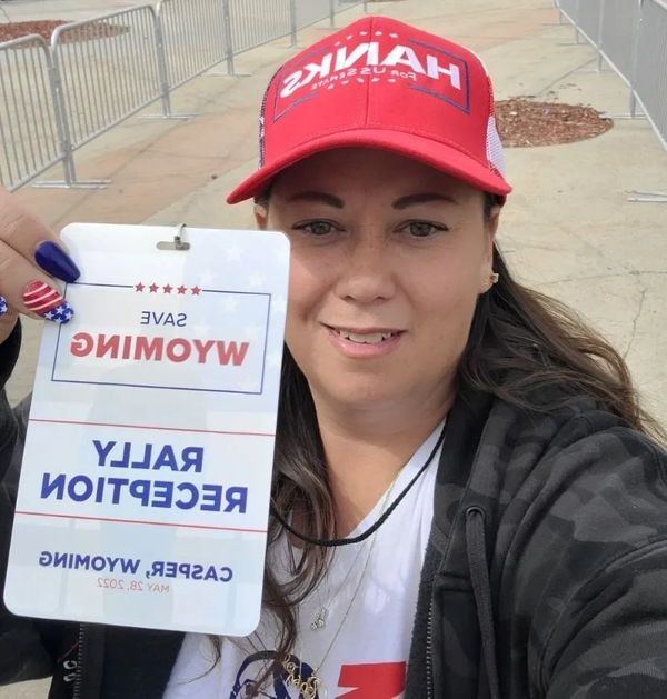 Christy Ruckus holding pass to Trump's Save America Rally in Casper, WY, 2022.