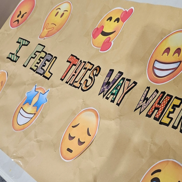 A colorful poster with emojis expressing different emotions and the phrase 'I feel this way when'.