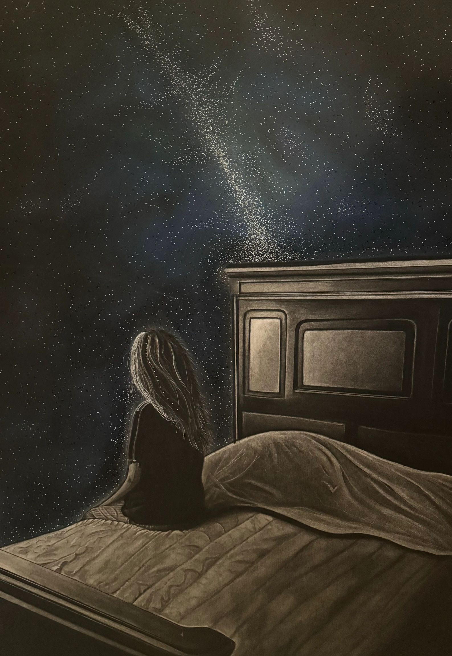 Woman sitting on a bed