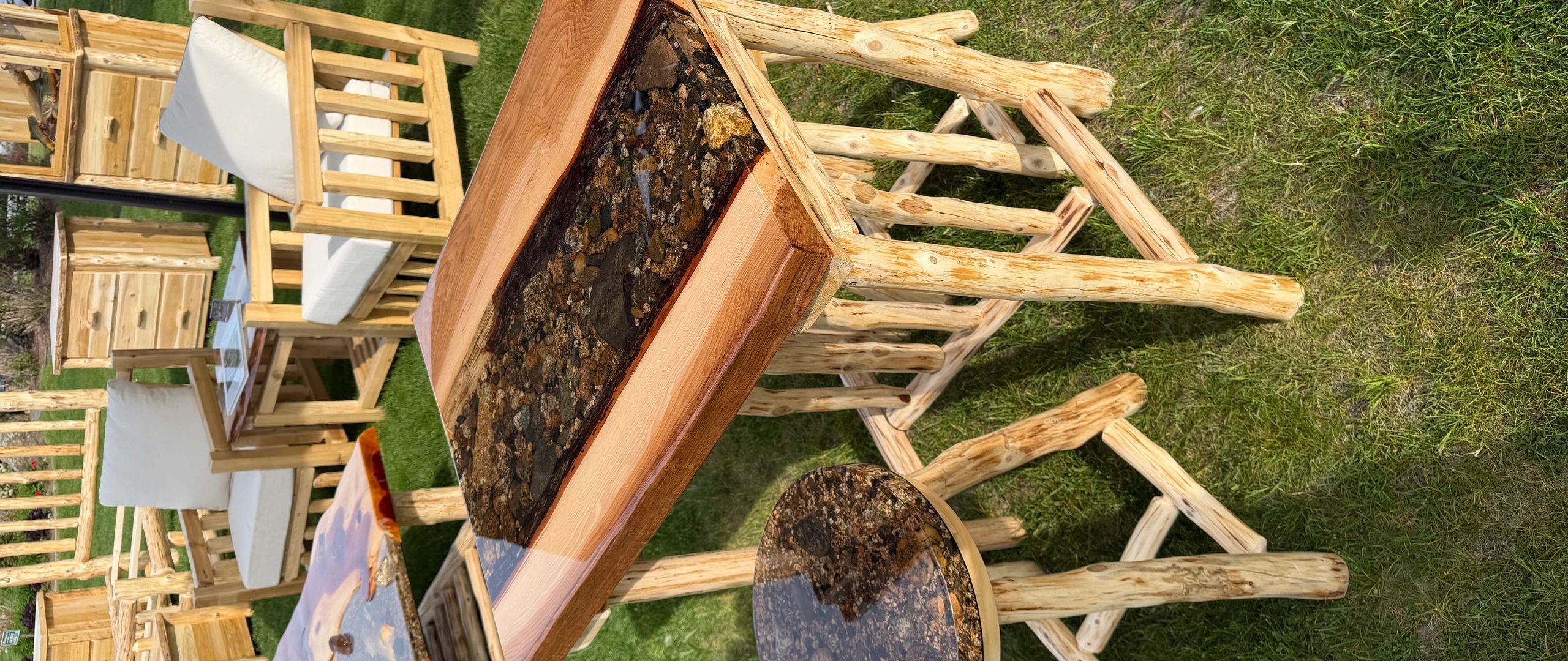 Rustic wooden furniture with resin inlay showcasing natural stone patterns.