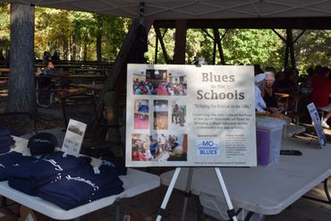 Information & merchandise tent  at the Mo Blues Blues in The Park event  held at the Jefferson City 