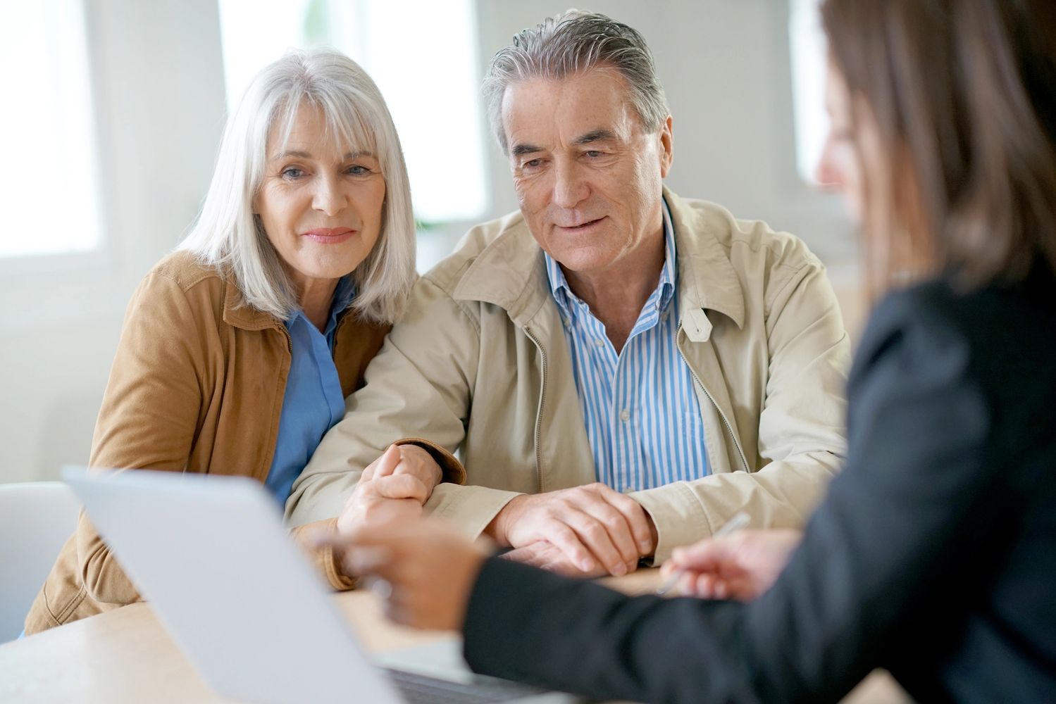 Elder couple looking at an estate planning