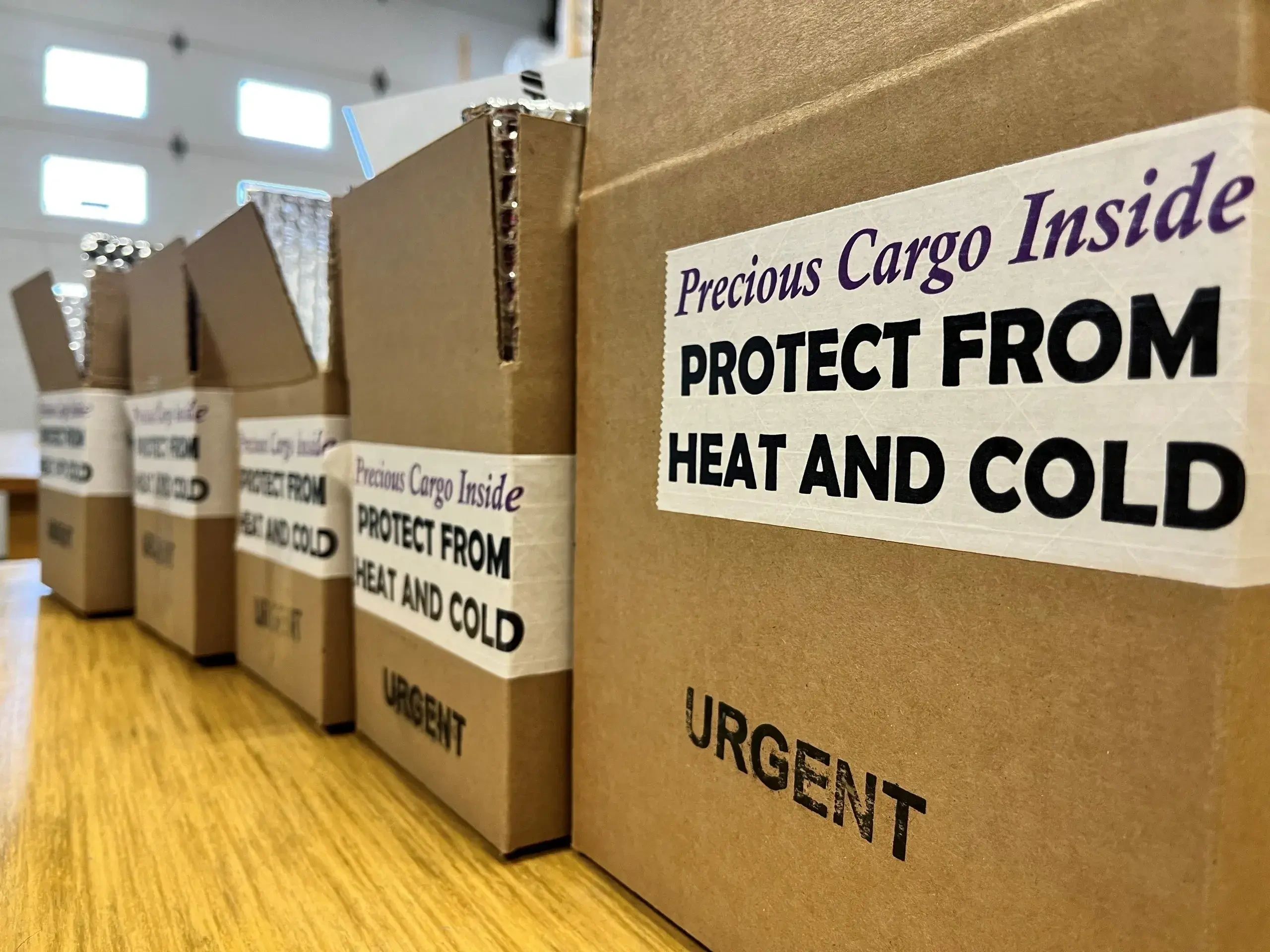 closeup shot of boxes with protect from heat and cold lables 
