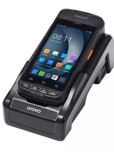 Urovo handheld device on charging dock.