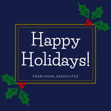 Festive 'Happy Holidays' greeting with holly decorations.