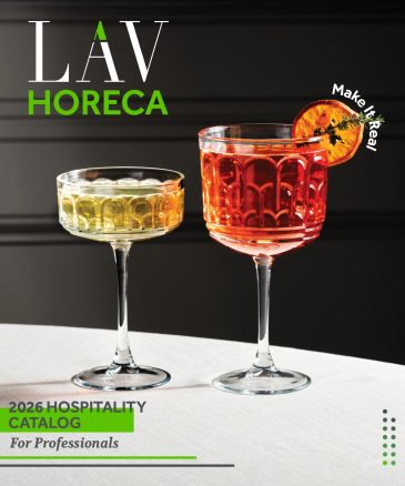 Two elegant cocktails in vintage glasses on a white tablecloth with hospitality catalog branding.