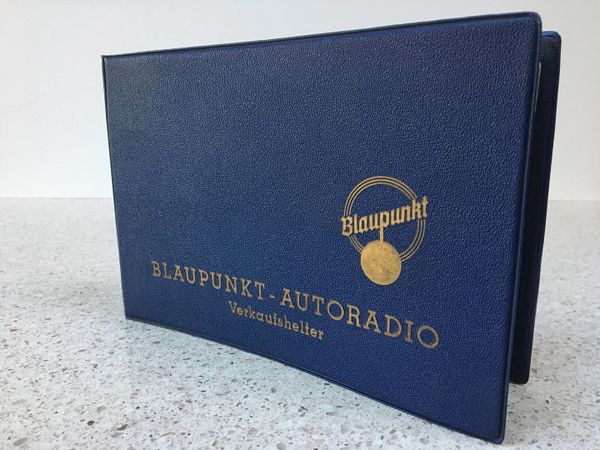 Vintage Blaupunkt Autoradio sales booklet with gold lettering on blue cover.