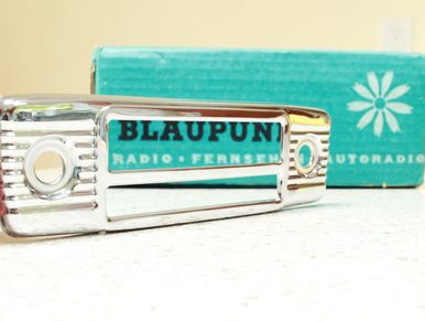 Vintage Blaupunkt car radio faceplate with original box.