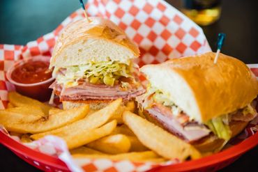 closeup shot of delicious sandwich and fries 