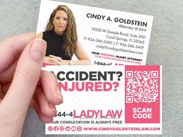 Business card for personal injury attorney Cindy A. Goldstein with contact info and QR code.