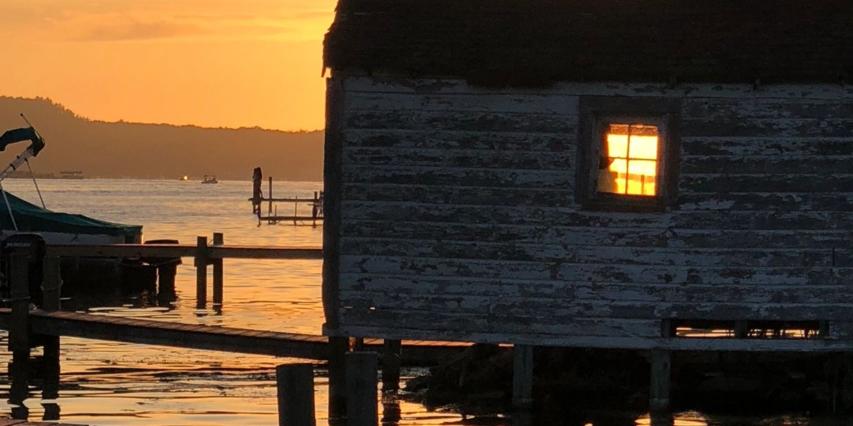 Beautiful Sunset on Pentwater Lake Boathouse
