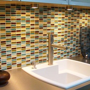 Glass tile backsplash.