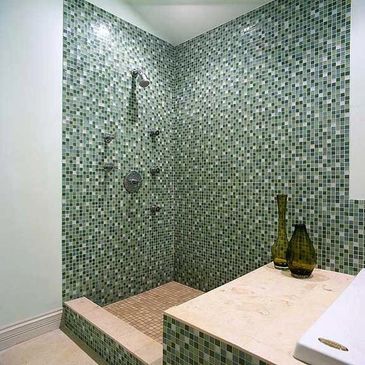 Glass mosaic shower.